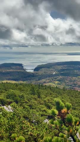 Inlet with Silver Sea and Moody Skies as Seen From Mountaintop on Dorr Ladder Trail (Acadia National Park, Maine, USA)