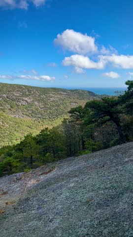 Rolling Green Mountains with Blue Skies and Bay on Dorr Mountain Trail (Acadia National Park, Maine, USA)
