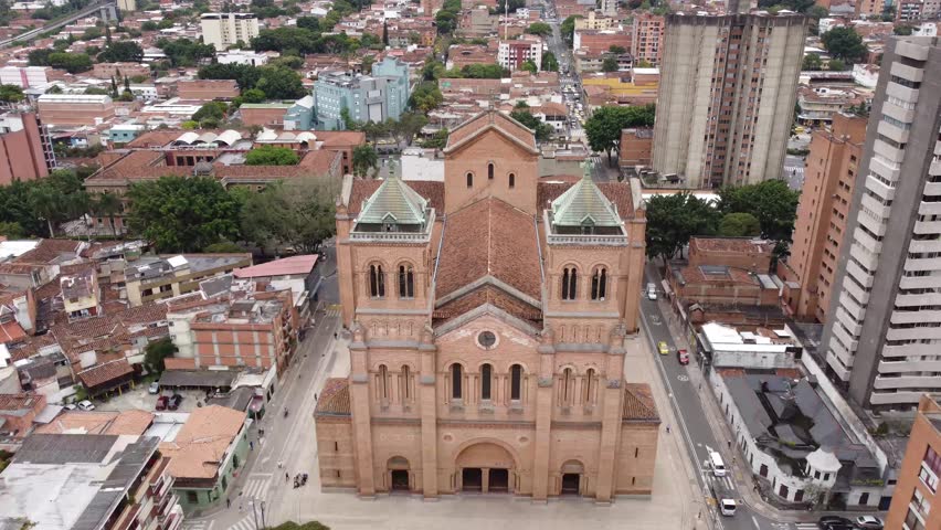 Medellin, Antioquia, Colombia - January 8, 2026. Aerial view of the Metropolitan Cathedral, an imposing brick structure that stands out in the urban landscape.