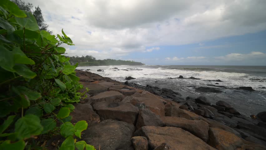 Rocky coastal shore with crashing ocean waves