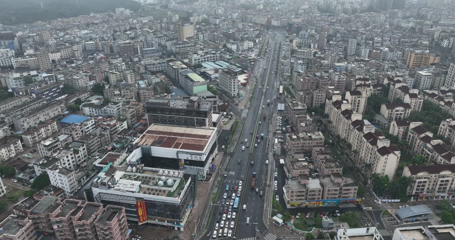 Shenzhen ,China - April 07 2024: Aerial footage of modern apartment houses under construction in shenzhen city, China