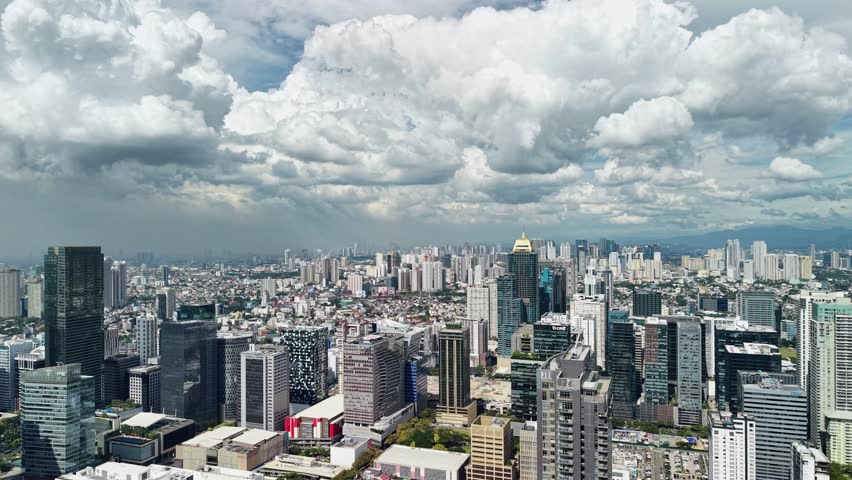 Breathtaking aerial footage captures Bonifacio Global City from an elevated vantage point, presenting Manila