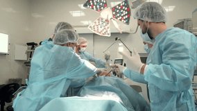 Surgical team performing a medical operation in a modern operating room, highlighting precision, sterile environment, teamwork, and advanced healthcare treatment. - Powered by Shutterstock - Get 15% off with code: PIKWIZARD15