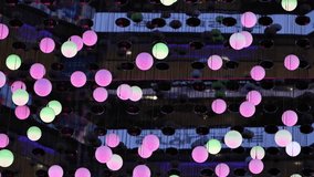Pink glowing spheres creating abstract light art installation at night - Powered by Shutterstock - Get 15% off with code: PIKWIZARD15