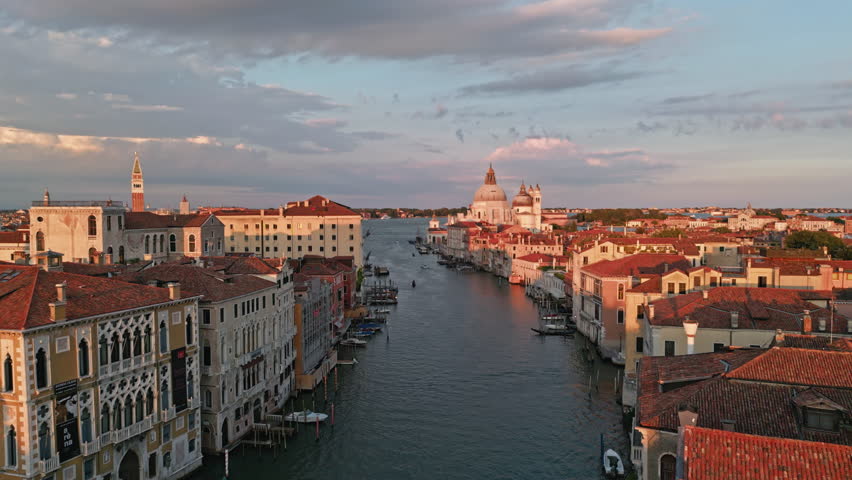 Venezia from aerial view. Venice Grand Canal and San Marco Square from aerial view. Venezia cityscape. Venice street. Venice skyline panorama. Venice along canals with historic architecture.