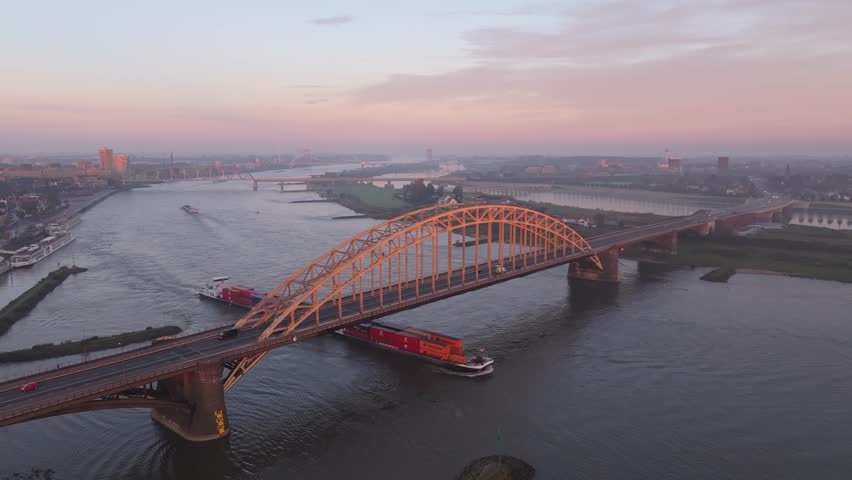 Drone footage of the Waalbrug bridge, ship, and Nijmegen city.