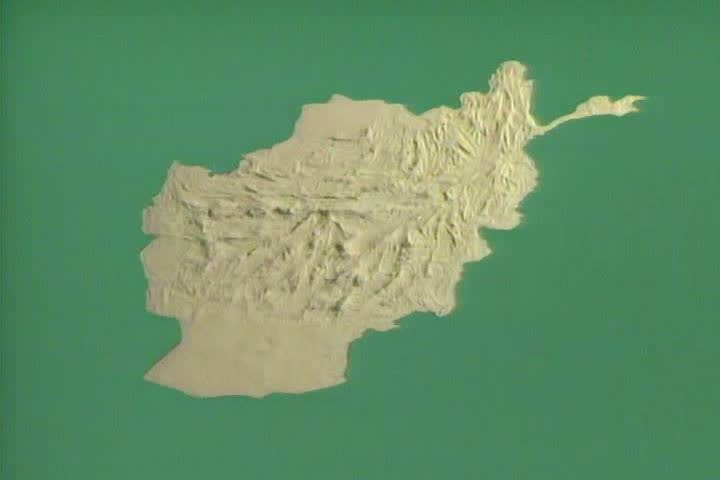 1980s - Montage of refugees from Afghanistan making their way to Pakistan during the Soviet invasion.