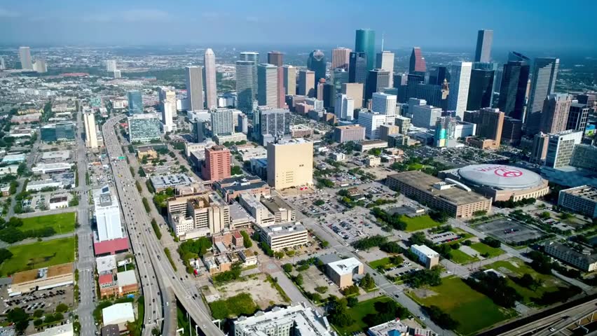 Aerial view of the Houston, Texas skyline on a clear day, expansive downtown cityscape with modern skyscrapers, urban development and travel concept.