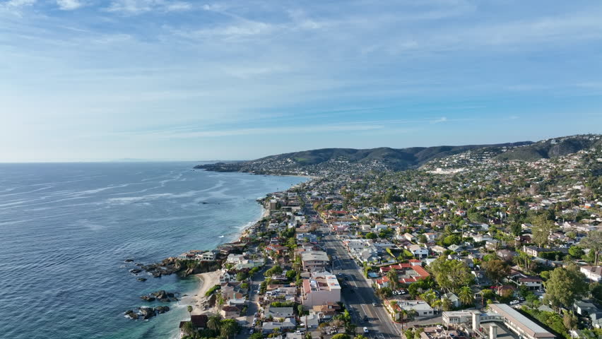 Coastal view of Laguna Beach. Laguna Beach oceanfront. Aerial flight over Laguna Beach. Laguna Beach from drone view.