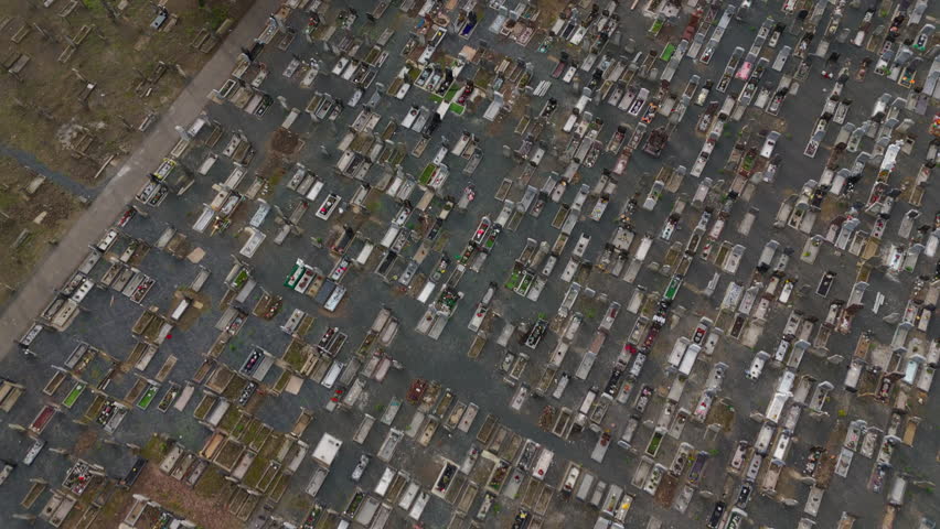 Aerial drone view of Mount Jerome Cemetery in Dublin, Ireland. 4K drone overhead footage of Mount Jerome Cemetery and Crematorium in Harold’s Cross, Dublin 6W, Ireland, showing Victorian tombs, headstones, pathways and historic grounds of this 1836‑established burial site.

