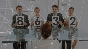 Animation of network of connections with data processing over business people holding numbers. Global business, finance, connections, networks and data processing concept digitally generated video. - Powered by Shutterstock - Get 15% off with code: PIKWIZARD15