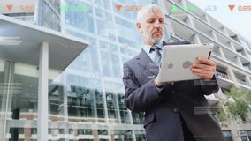 This businessman is using a digital tablet in an office building. Global business data processing digital interface technology and networking concept digitally generated video. - Powered by Shutterstock - Get 15% off with code: PIKWIZARD15