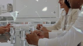 Animation of network of connections over diverse business people using tablets. Global business data processing and digital interface during covid pandemic concept digitally generated video. - Powered by Shutterstock - Get 15% off with code: PIKWIZARD15