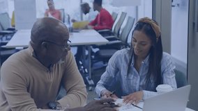 Animation of globe of network of connections over diverse man and woman discussing at office. Global networking and business technology concept - Powered by Shutterstock - Get 15% off with code: PIKWIZARD15