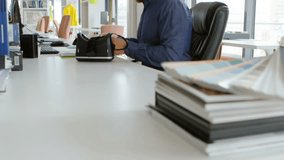 Animation of digital icons over caucasian businessman wearing vr headset. global data processing, connections, digital interface and data processing concept digitally generated video. - Powered by Shutterstock - Get 15% off with code: PIKWIZARD15