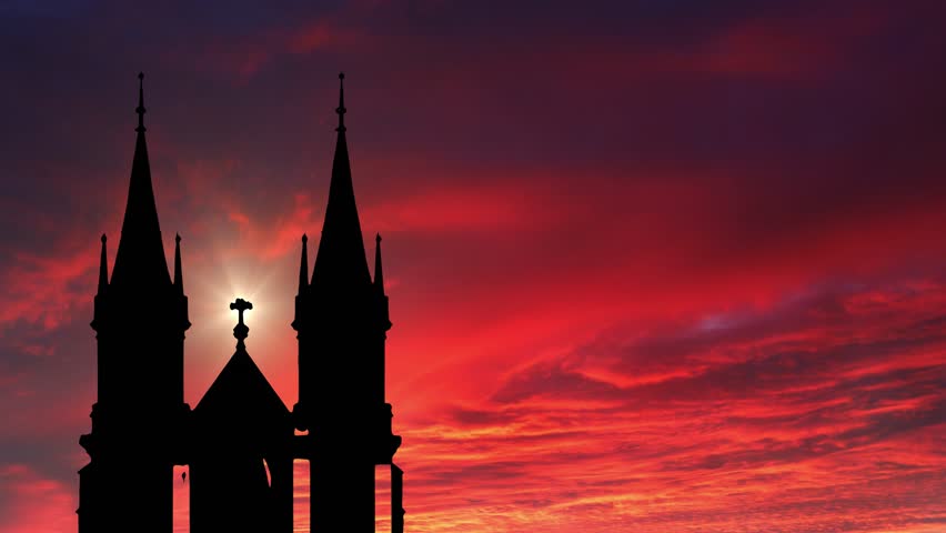 Church Silhouette Against a Warm Sunset Sky