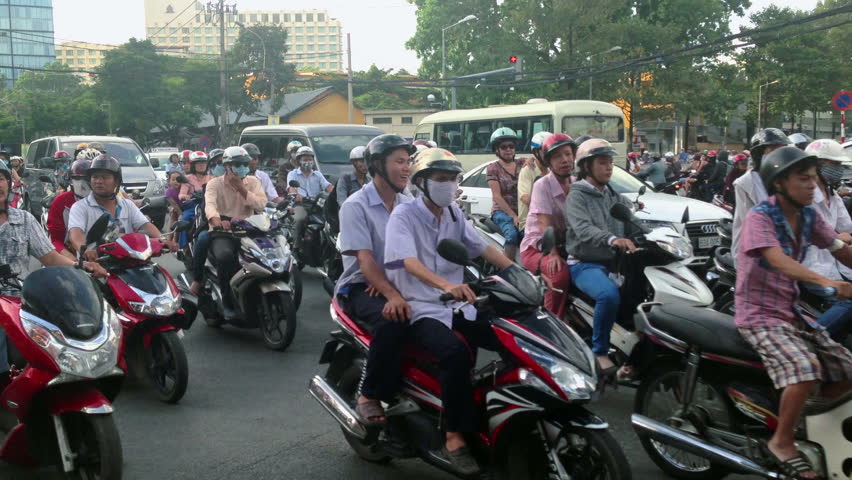 HO CHI MINH CITY - MAY 28: View on crazy scooter commuter traffic in the streets