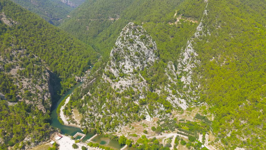 Cakallar, Alanya, Turkey. Drone shot of Alara Castle in natural mountain landscape with river valley. Aerial View, Point of interest