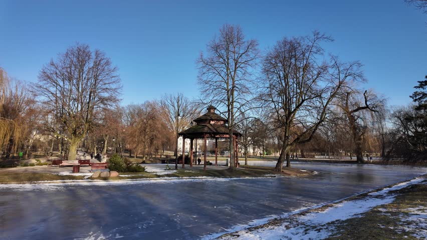 A frosty day in the city park in Zdunska Wola, Poland.