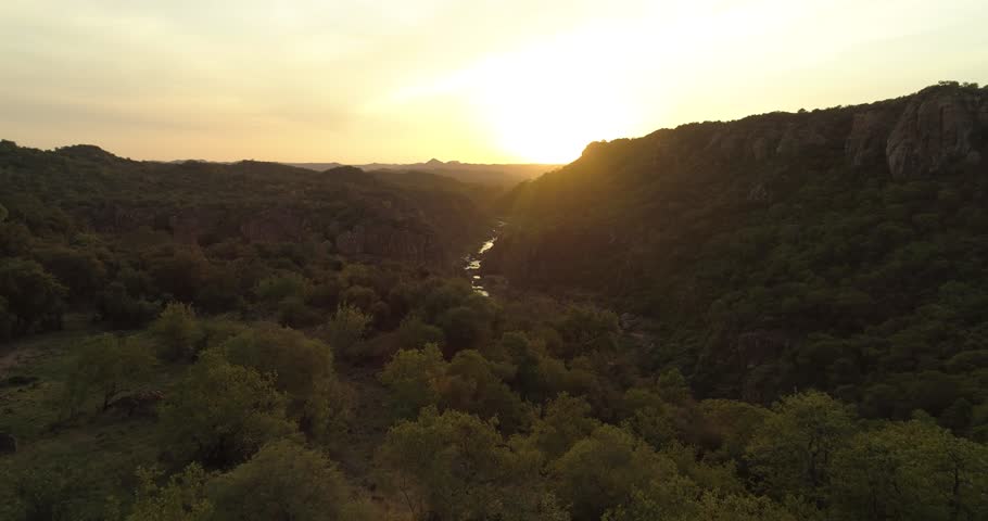 Sunrise aerial shot flying over a canyon. Kruger National Park, South Africa