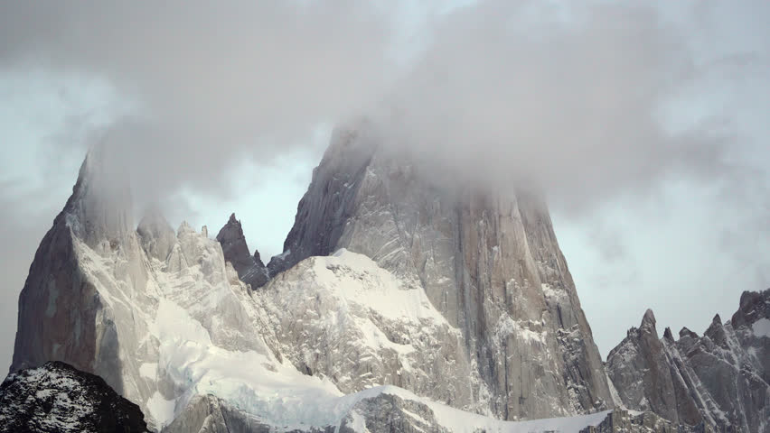 Close-up view of fast moving clouds over Mount Fitz Roy and Poincenot peaks, El Chalten, Patagonia.