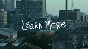 Animation of learn more text banner against aerial view of cityscape. Social media networking and business technology concept - Powered by Shutterstock - Get 15% off with code: PIKWIZARD15