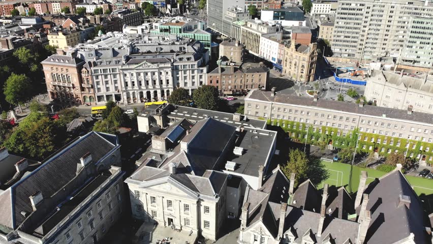 Trinity Old College, Parliament Square and Library with Dublin cityscape. Drone Aerial