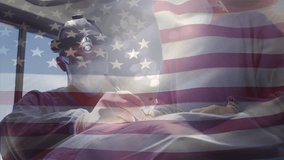 Animation of waving usa flag over diverse male and female surgeons performing operation at hospital. Global medical healthcare concept - Powered by Shutterstock - Get 15% off with code: PIKWIZARD15