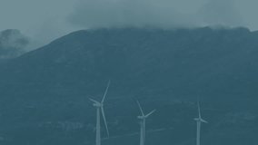 Animation of financial data processing over wind turbines. Global environment, sustainability, wind energy, computing, connections and data processing concept digitally generated video. - Powered by Shutterstock - Get 15% off with code: PIKWIZARD15