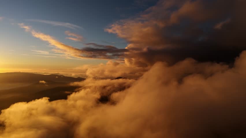 Aerial View of Clouds Heaven at Golden Sunset
