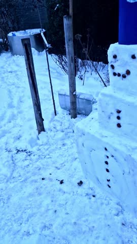 geometric snowman. It looks like someone traded traditional rolling method for some serious architectural precision—Frosty Cube. cubic shape