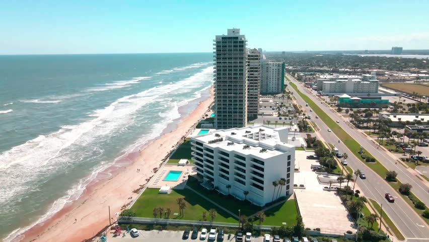 Daytona Beach Florida Drone Flyover View Facing South Towards Highrise Buildings 2025