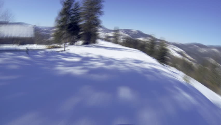 Motion camera view of skier is riding in the mountains. pov.