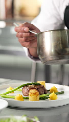 Hands, meat and plate with chef in kitchen for hospitality, culinary skill and gourmet diet. Gastronomy, cuisine and premium catering with person and steak in restaurant for cooking, sauce and food