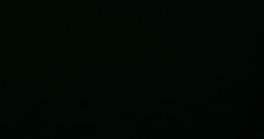 Slow Motion  Minimal Cinematic Shot Of Baseball Ball Floating On Black Background With Soft Studio Lighting. Concept Of Sport, Focus, Strength, Motion