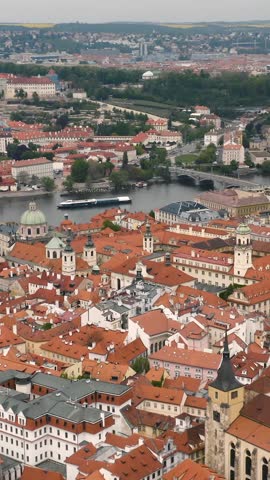 Vertical Panorama of Prague Old Town Rooftops and Vltava River
