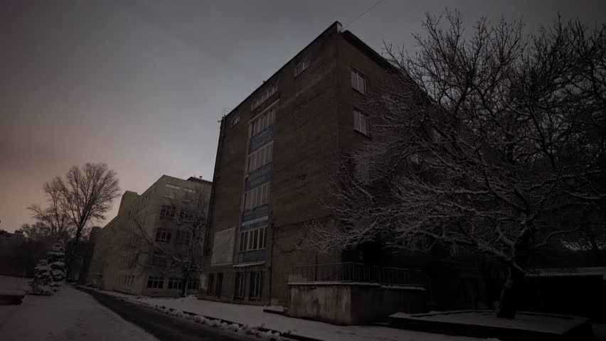 Power fails after missile fire. Snow blankets empty avenues. No lights glow in the buldings. Before dawn, the city feels abandoned, held still by cold and shock.