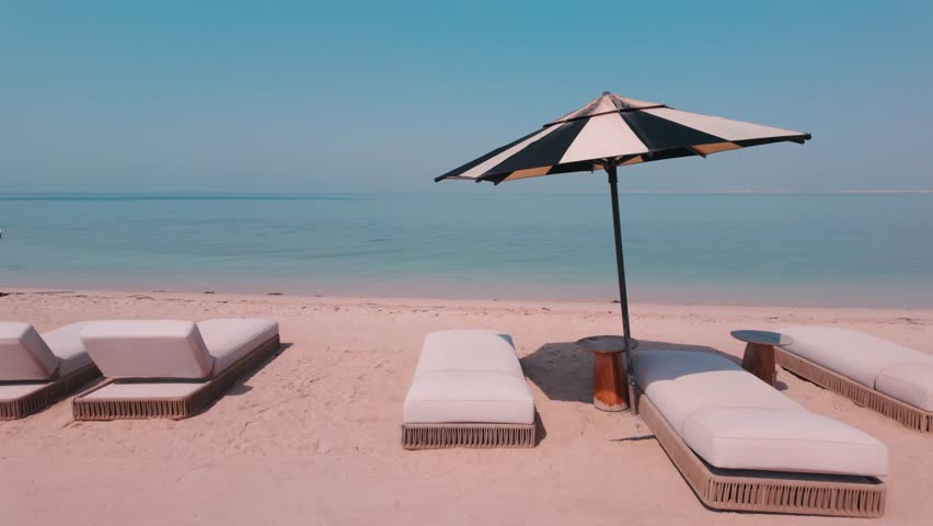 Enjoying seaside luxury nature resort at Ras Abroouq in Zekreet, Qatar on sunny day