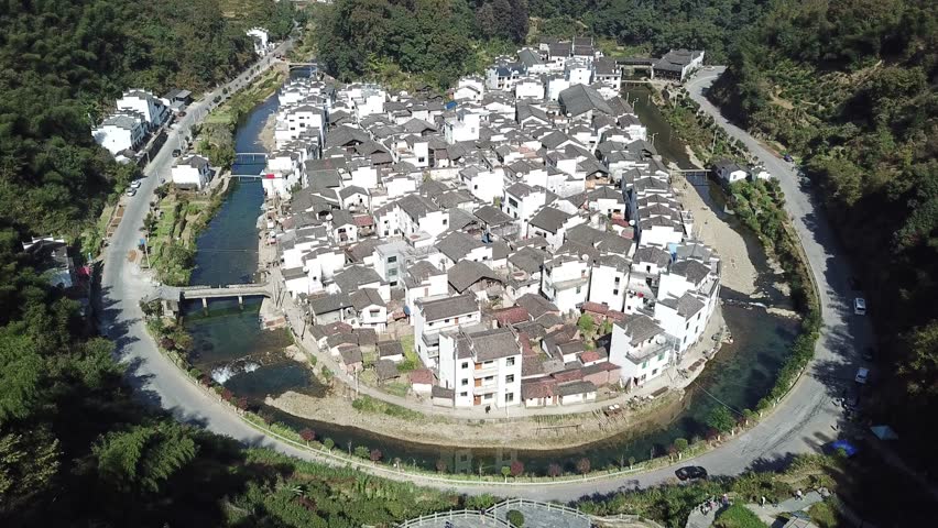This 4K aerial time-lapse video features the iconic ancient villages of Huangling and Shicheng in Wuyuan, Jiangxi, showcasing exquisite Huizhou-style historic architecture and well-preserved ancient building clusters. It captures the unique charm of these traditional Chinese mountain villages, blending ancient rural architecture with idyllic rural landscapes, presenting the profound cultural heritage of China’s ancient villages, ideal for cultural tourism and rural theme content.