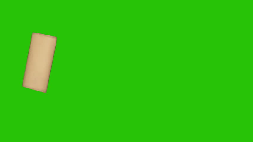 Very short translucent masking tape stub in stop motion on green screen, subtle taped detail for corners, tags or tiny notes.