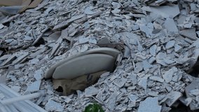 Close-up of Mixed Construction Waste Including Tiles Wood and Gypsum Board - Powered by Shutterstock - Get 15% off with code: PIKWIZARD15