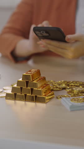 gold bar placed on financial report as concept for stable investment and economic planning