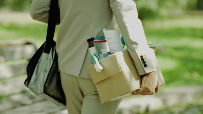 Businessman After Being Fired. Job Loss And Unemployment Crisis. Employee Leaving Workplace Due To Staff Reduction Or Resignation. Professional Career Changes Economic Instability Dismissal Job Loss