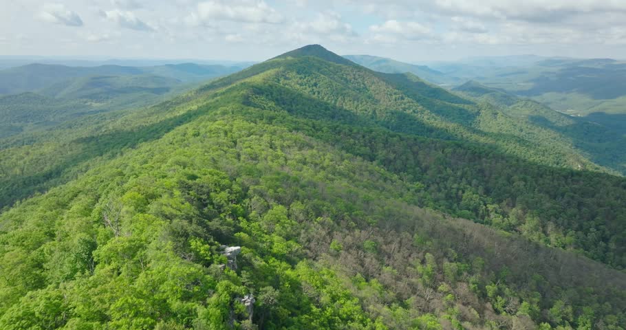 Drone aerial of forested mountains and rolling ridges in West Virginia, Appalachian region