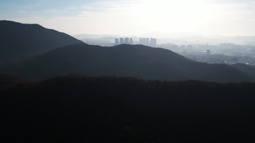 Sun-filled mountain scenery seen from the sky