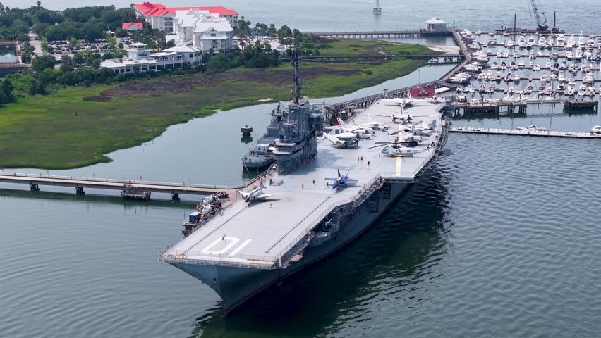 A drone captures the USS Yorktown aircraft carrier moored at Patriot