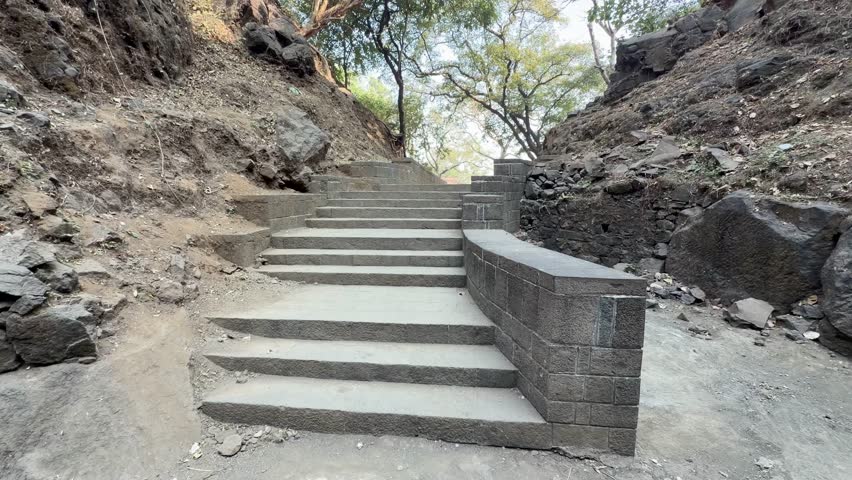 Rock-cut temple colonnade at Elephanta Caves on Elephanta Island, Mumbai Harbor, Maharashtra, India.