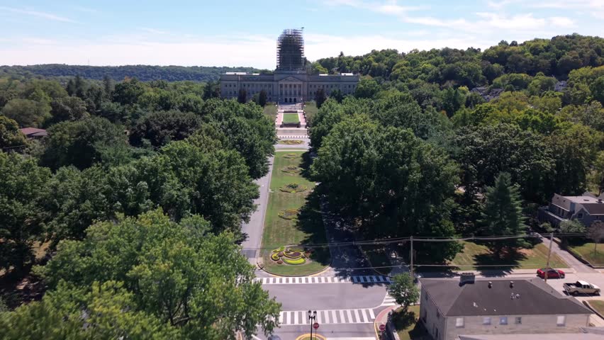 Kentucky State Capitol building in Frankfort undergoing a major, multi-year, multi-million dollar renovation - high-speed push in aerial view in daytime