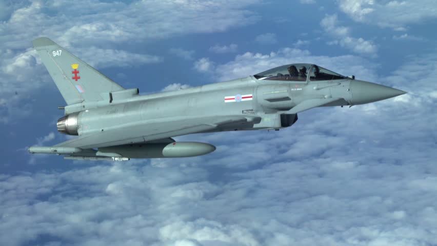 Modern Fighter Jet Flying Above Clouds on Combat Mission