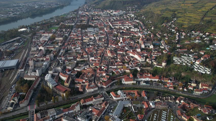 Aerial panoramic view around the old town city Krems an der Donau in Austria on a sunny autumn morning day